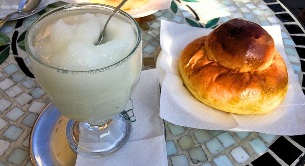 Granita and rounded brioche for breakfast in Sicily